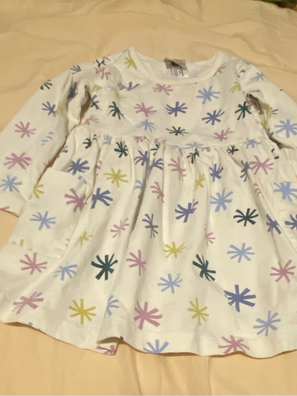 Hanna Andersson Cream Knit Dress with Pastel Starburst Print